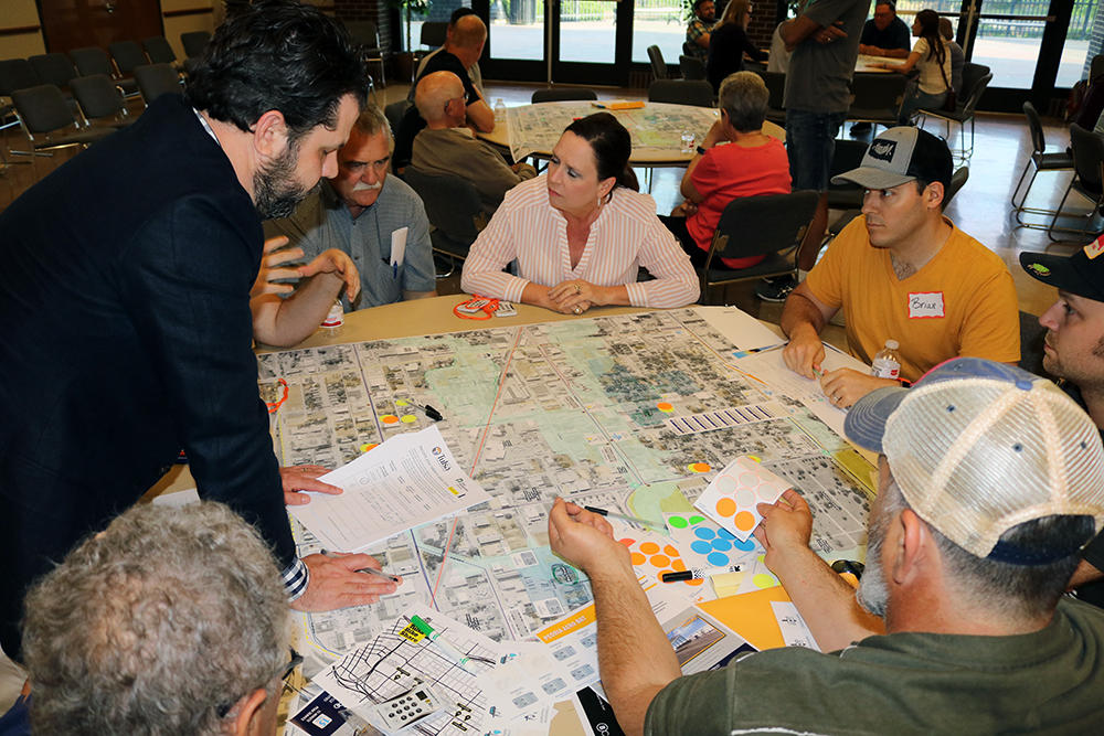 People gathered for a community planning meeting