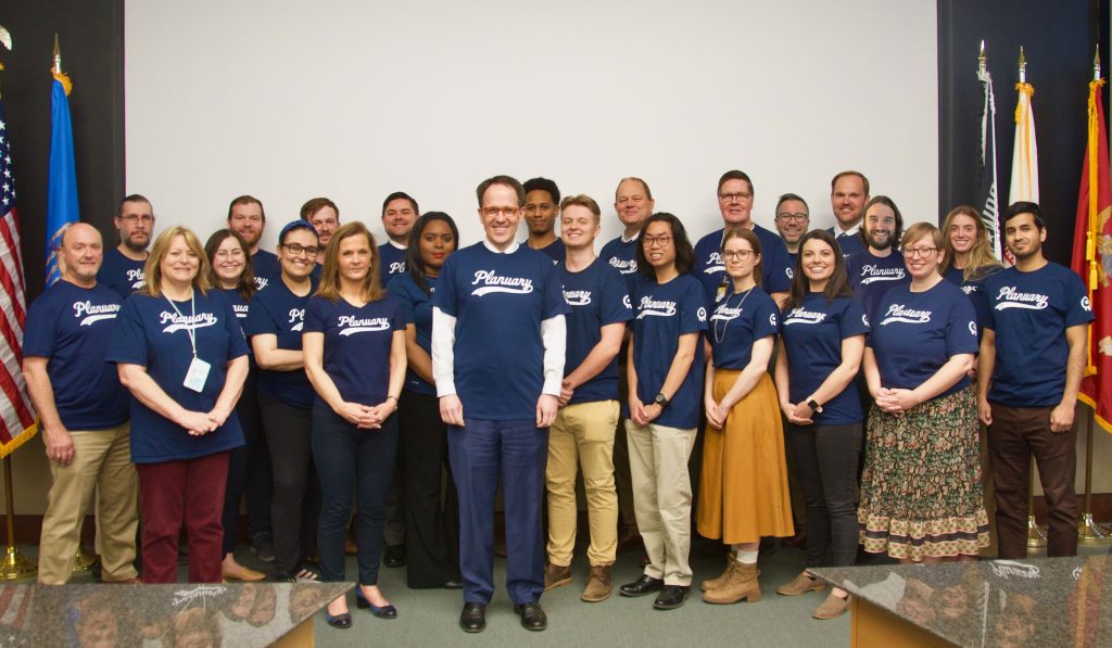 Photo of Tulsa Planning Office staff with City of Tulsa officials, all wearing Planuary t-shirts.